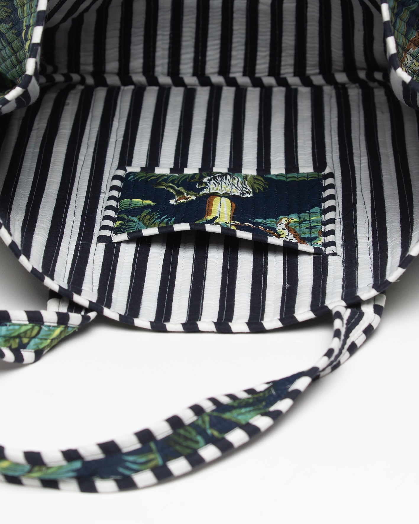 NAVY BLUE JUNGLE PRINTED PINK BAG