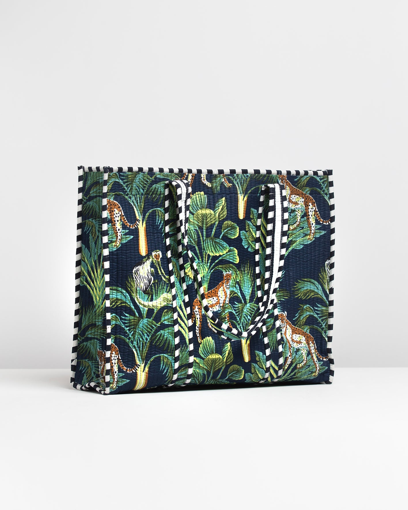 NAVY BLUE JUNGLE PRINTED PINK BAG