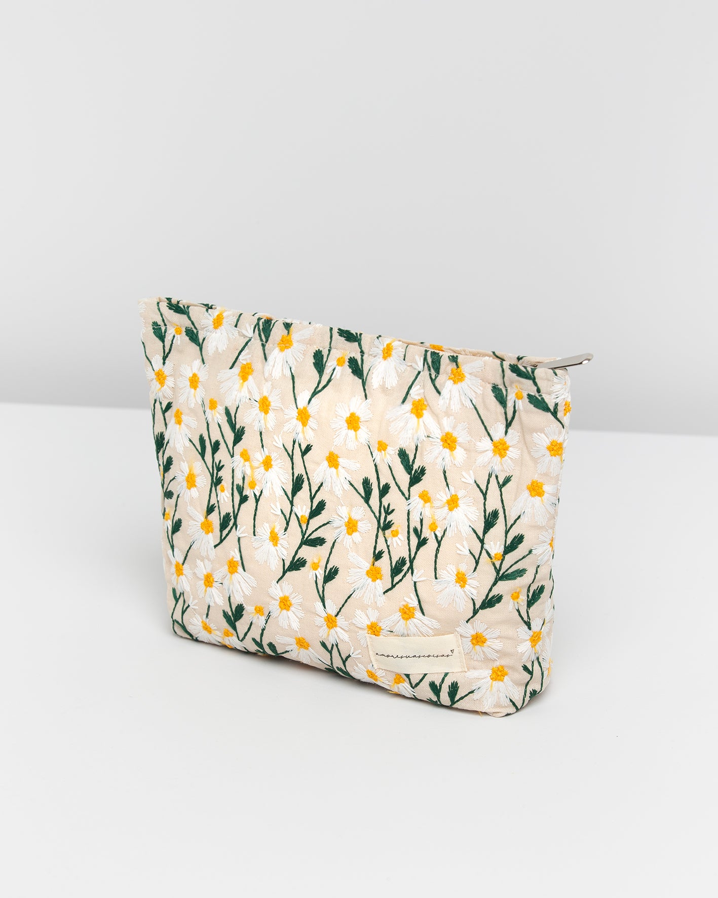 OFF TOILETRY BAG WITH DAISY DESIGN