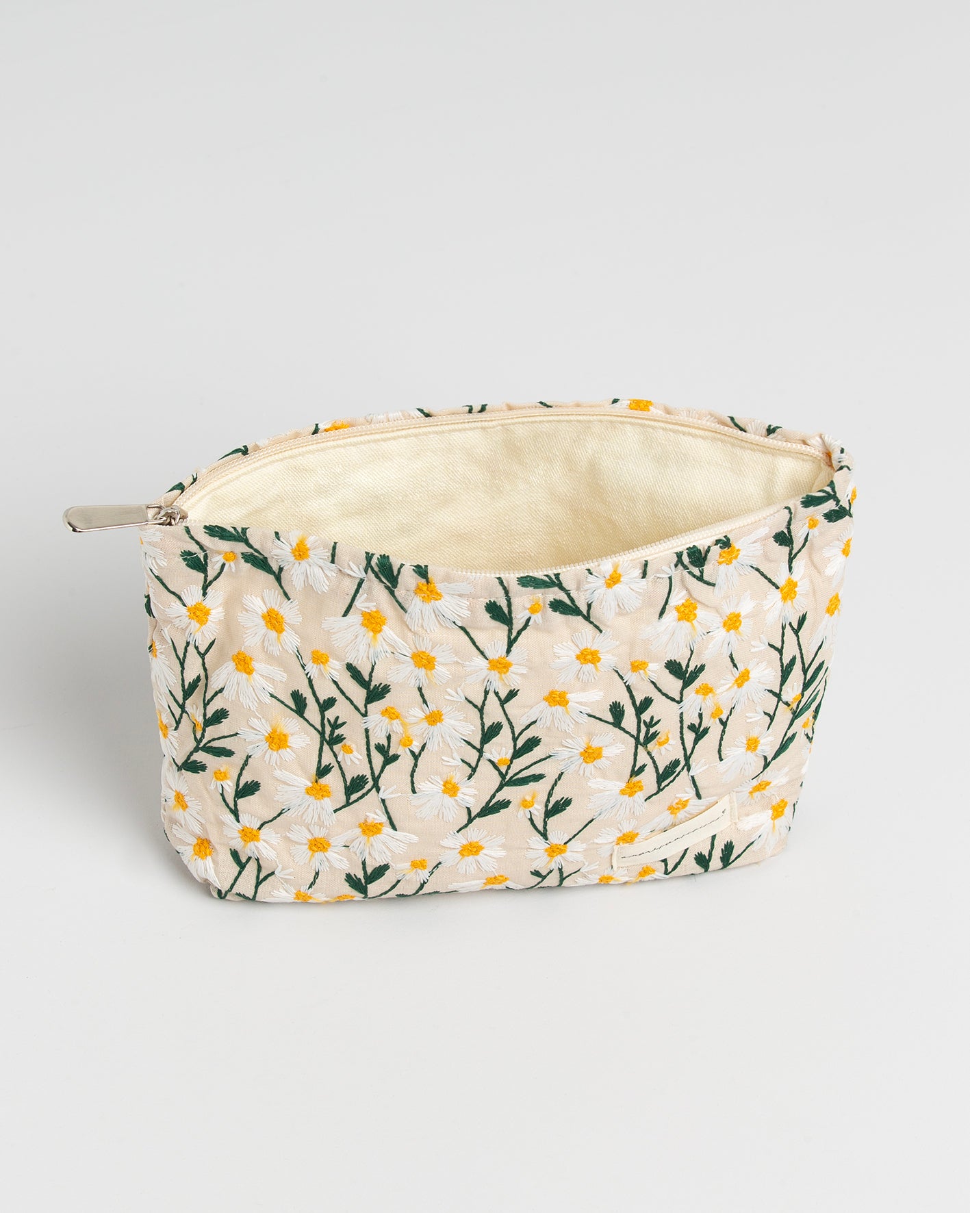 OFF TOILETRY BAG WITH DAISY DESIGN